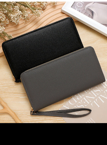 Premium Unisex Geldbörse mit Handschlaufe – Langes Portemonnaie aus Kunstleder (veganem Leder). Große Brieftasche & Travel Clutch für Damen & Herren