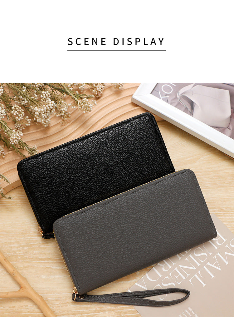 Premium Unisex Geldbörse mit Handschlaufe – Langes Portemonnaie aus Kunstleder (veganem Leder). Große Brieftasche & Travel Clutch für Damen & Herren