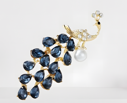 Elegante Pfauen-Brosche – Blaue und goldene Kristalle