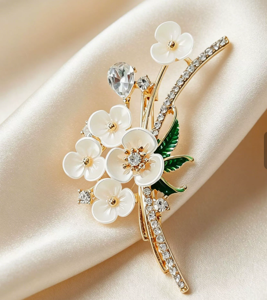 Elegante Blumenbrosche mit Perle und Kristallen