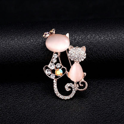 Brosche „Zwei Katzen“ – elegantes Accessoire mit rosa Steinen und Strass